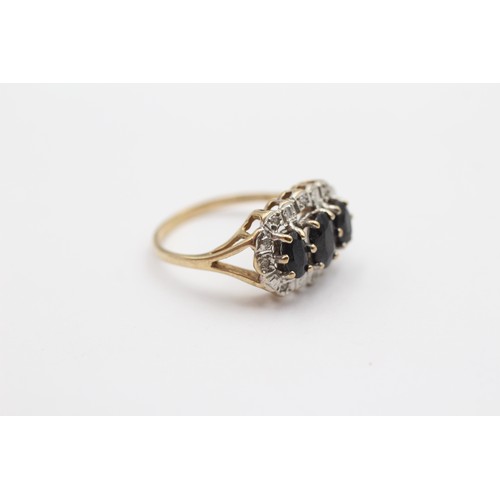 412 - A 9ct gold sapphire and diamond triple cluster ring, K, 2.3gm