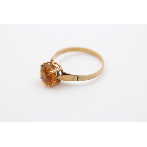 421 - A 9ct gold and citrine single stone ring, M, 1.6gm