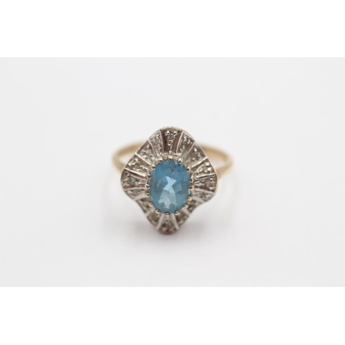 424 - A 9ct gold blue topaz and diamond cluster ring, M 1/2, 2.7gm