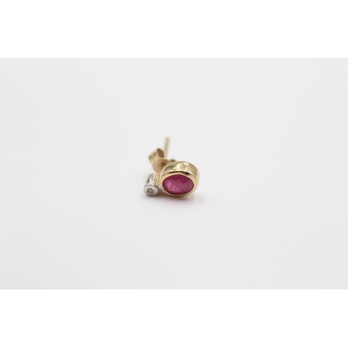 425 - A 9ct gold ruby and diamond pair of ear studs, 0.7gm