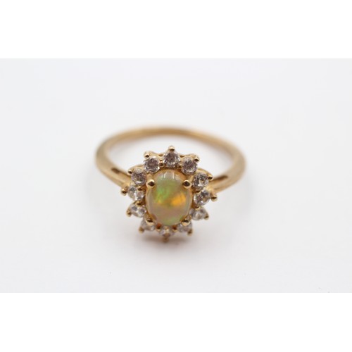 427 - A 9ct gold opal and white stone cluster ring, O, 2.8gm