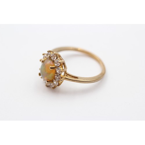 427 - A 9ct gold opal and white stone cluster ring, O, 2.8gm