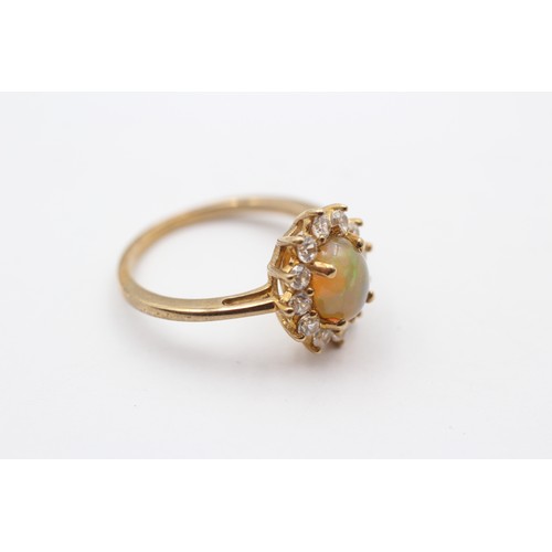 427 - A 9ct gold opal and white stone cluster ring, O, 2.8gm