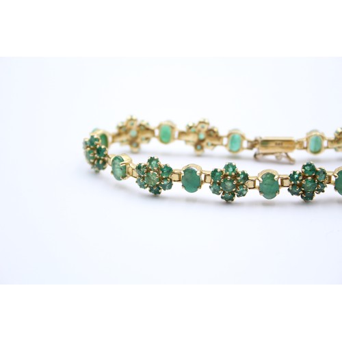 430 - A 14K gold emerald and treated emerald cluster bracelet, 18cm, 12.3gm.