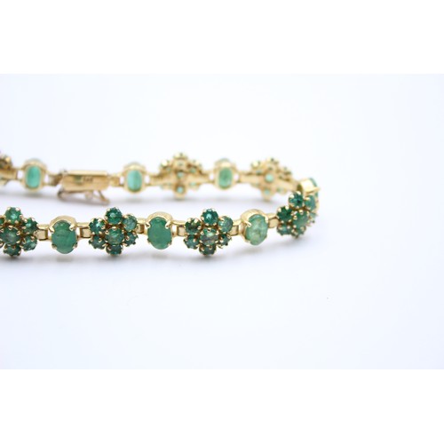 430 - A 14K gold emerald and treated emerald cluster bracelet, 18cm, 12.3gm.