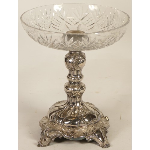 20 - A table centrepiece with cherub holding a branch, lacking dish support and other metalwares.