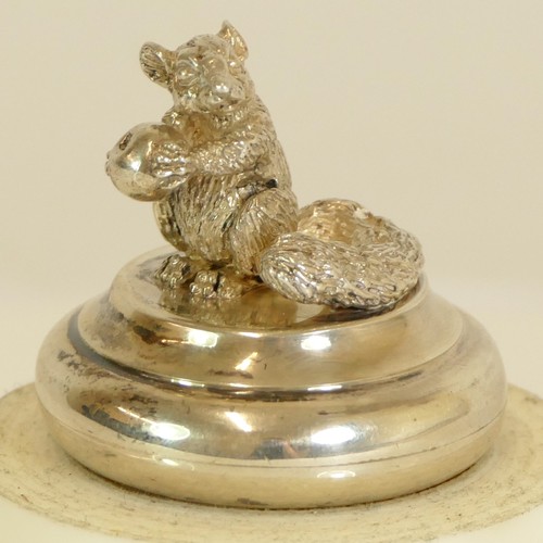 42 - Brian Leslie Fuller, a silver bottle stopper, London 1983, with cast squirrel finial, and two other ... 