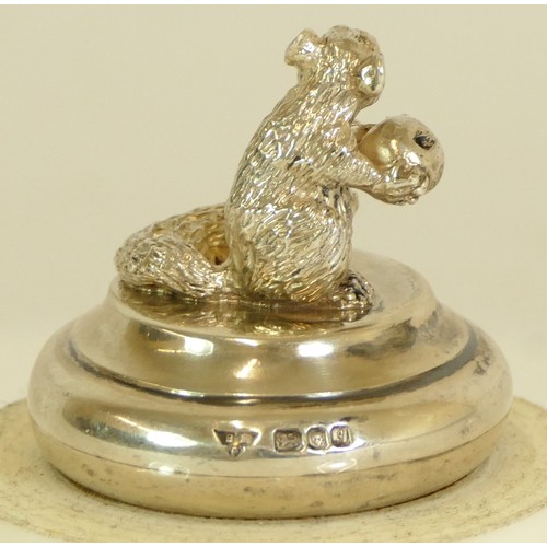 42 - Brian Leslie Fuller, a silver bottle stopper, London 1983, with cast squirrel finial, and two other ... 