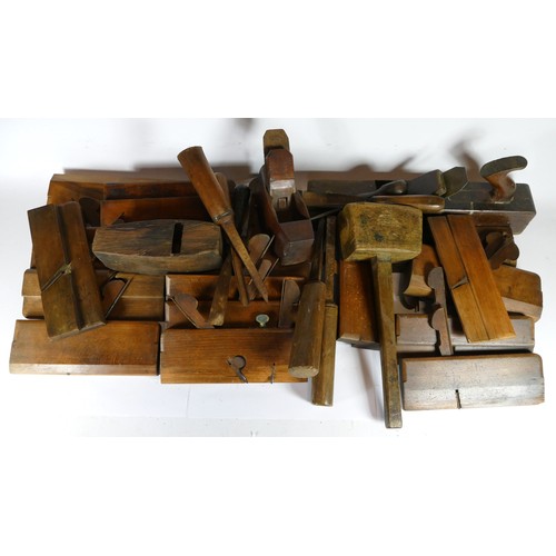 38 - A collection of early 20th century carpenters tools, to include molding planes, chizels, and box pla... 