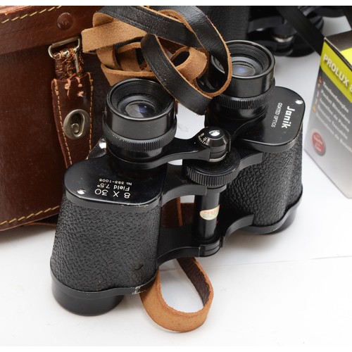 A collection of twelve pairs of binoculars, to include Nipole Charles