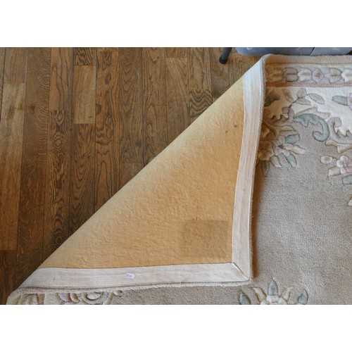 A pair of hand full cut wool rugs, with traditional floral design in ...