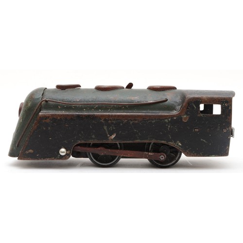 1 - An early 20th century clockwork locomotive, painted green livery, 20cm long.