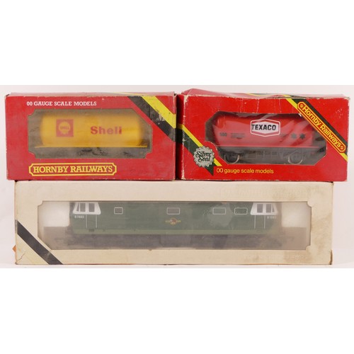 81 - Hornby, OO gauge, a collection which includes 1x D7063 locomotive and 2x tank wagons, all boxed (3)