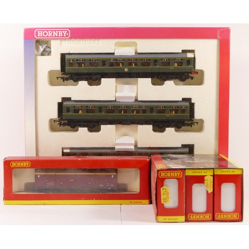 88 - Hornby, OO gauge, a collection which includes a 3x carriage set, a 3x freight rolling stock set and ... 