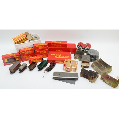 102 - Triang, OO gauge, a collection of misc track, some boxed track pieces, a power unit, accessories whi... 