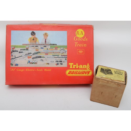 108 - Hornby Dublo tin toy train set with 3x boxed carriages, track, 3x boxed wagons and a locomotive 8005... 