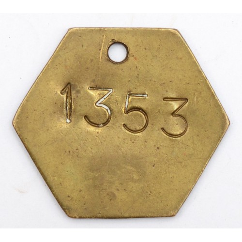 135 - 'L.N.W.R 3141' cast-iron wagon plate together with an L.M.S.R Bradford pay-check. (2)