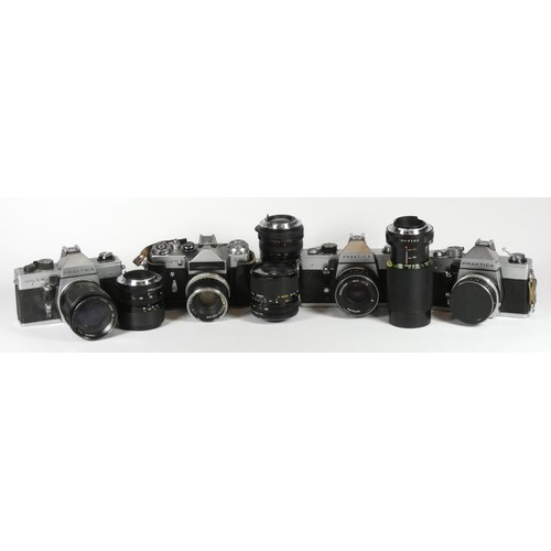 190 - Four 35mm film cameras with lenses to include a Zenit EM with a Mamiya 5.mm f2, a Praktica MTL3 with... 