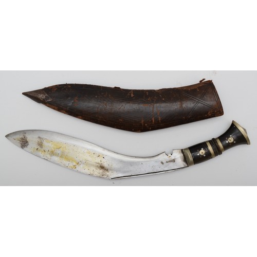 481 - An Indian kukri, the 32cm blade pick dot decorated, with leather scabbard.
This bladed product is no... 