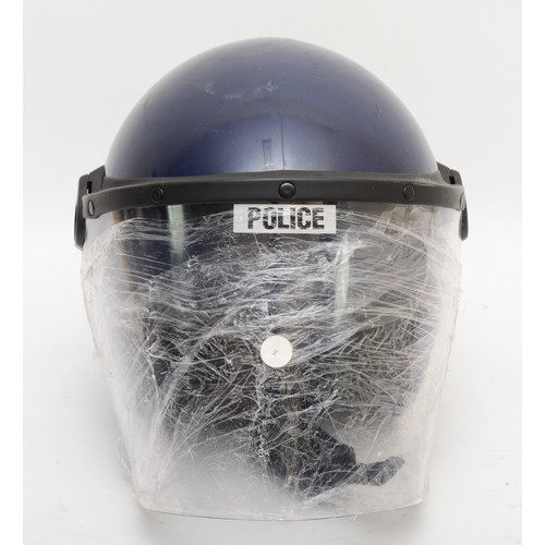 510 - A police riot helmet, new and unused.