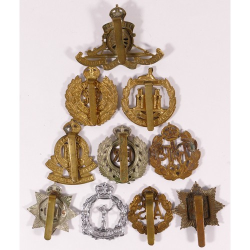 514 - Ten military cap badges, including Dorsetshire and RAF