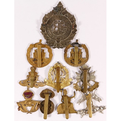 516 - Ten military cap badges, including Dorsetshire and Lancers