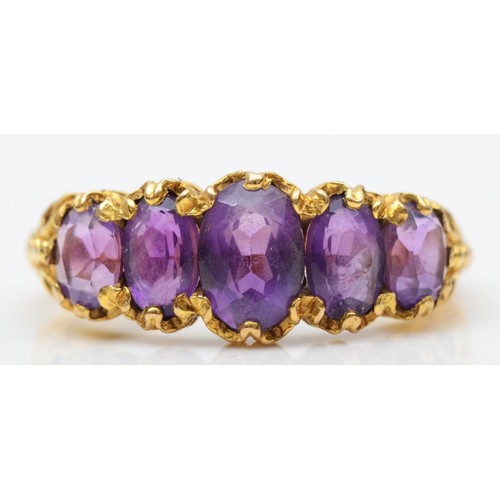 A vintage 9ct gold five stone amethyst ring, fancy claw set with graduated stones, P, 3.9gm