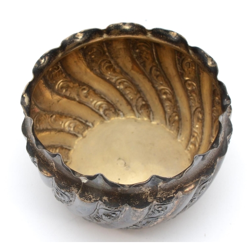 30 - A Victorian silver bowl with embossed scrolling decoration, Birmingham 1893, 9 x 6cm, 69gm.