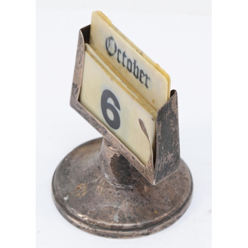 48 - A silver desk calendar, 8 x 6cm.