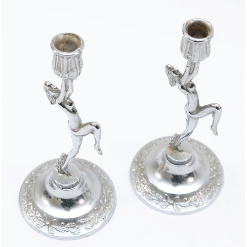 49 - A pair of silver plated candle sticks in the Art Deco style, 11.5 x 5cm.