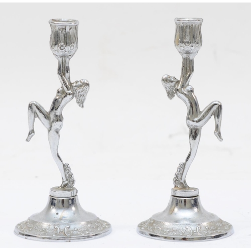 49 - A pair of silver plated candle sticks in the Art Deco style, 11.5 x 5cm.