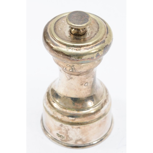 50 - A silver plated mechanical pepper pot,9 x 4.5cm.