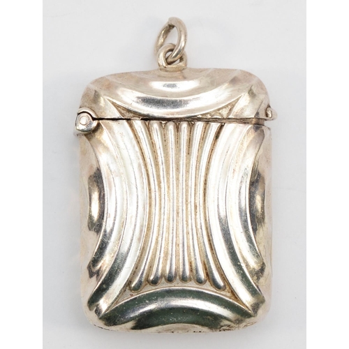 58 - An electroplated vesta case, with embossed decoration, 5 x 3.5cm.