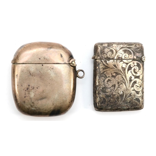 59 - A Victorian silver vesta case, Birmingham 1889, with chased scroll decoration, together with another... 