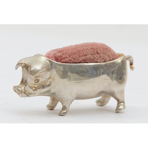 67 - An Elizabeth II silver pig pin cushion, London 1997, 4.5cm, 21gm.