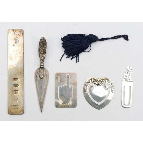 69 - A group of silver bookmarks to include a Victorian trowel stamped silver, 27gm combined.