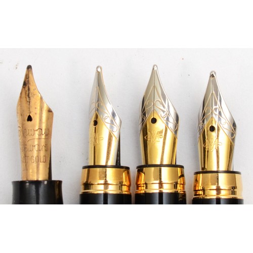 75 - A Conway Stewart fountain pen with 14k gold nib with a matching propelling pencil, cased and three l... 