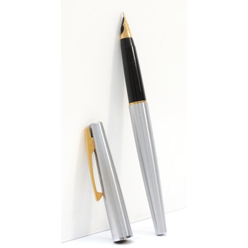 78 - Sheaffer, a steel bodied fountin pen with 14k gold nib, 14cm.