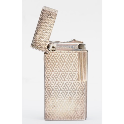 87 - Dunhill 70, a silver plated gas lighter with engine turned decoration, serial number BQ022, case.