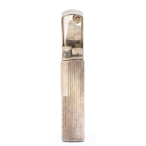 87 - Dunhill 70, a silver plated gas lighter with engine turned decoration, serial number BQ022, case.