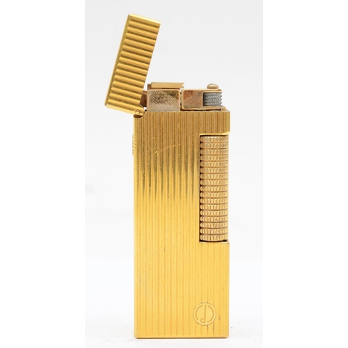 91 - Dunhill, a rollagas gold plated cigarette lighter, 6.5cm