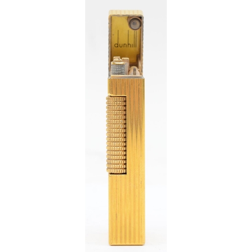 91 - Dunhill, a rollagas gold plated cigarette lighter, 6.5cm