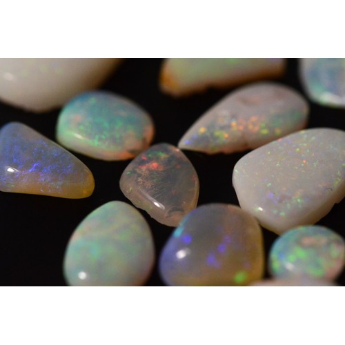 161 - Loose free form cut Opals, flashes of blue, red, orange, green, Cooper Pedy Australia, total weight ... 