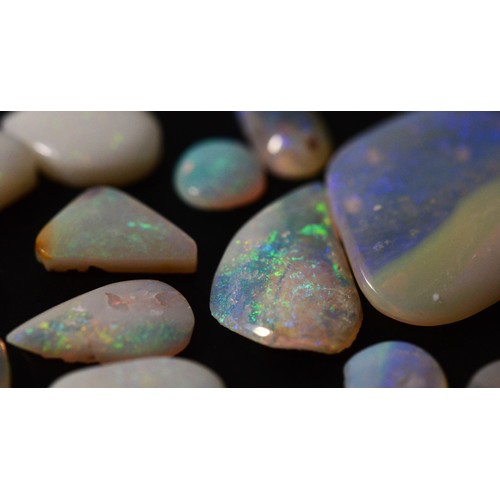 161 - Loose free form cut Opals, flashes of blue, red, orange, green, Cooper Pedy Australia, total weight ... 