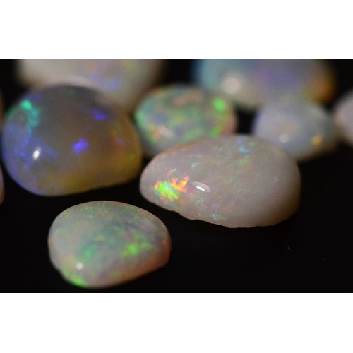 161 - Loose free form cut Opals, flashes of blue, red, orange, green, Cooper Pedy Australia, total weight ... 