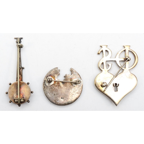 165 - Three musical brooches to include a musical note example stamped 925, 3cm, and two others with one m... 