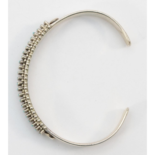 Bryant Waatsa Jr, a silver Zuni needlepoint bangle set with turquoise