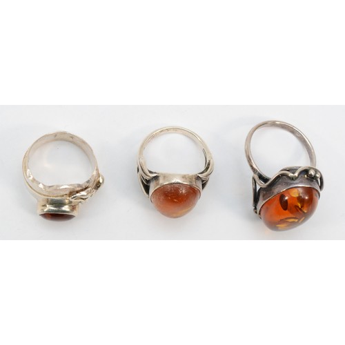 211 - Three silver Baltic amber rings, size L, O - P, 24gm.