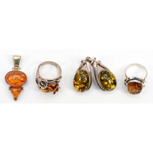 213 - A group of silver Baltic amber jewellery including two rings, size L-M and P, 28gm.