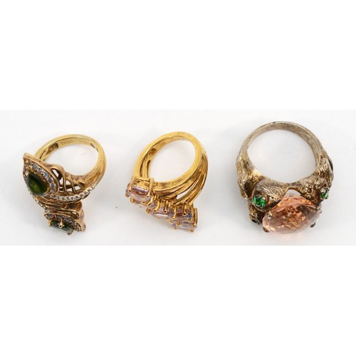 216 - Three silver gemset rings including a leaf example, sizes M, R, L, 30gm.